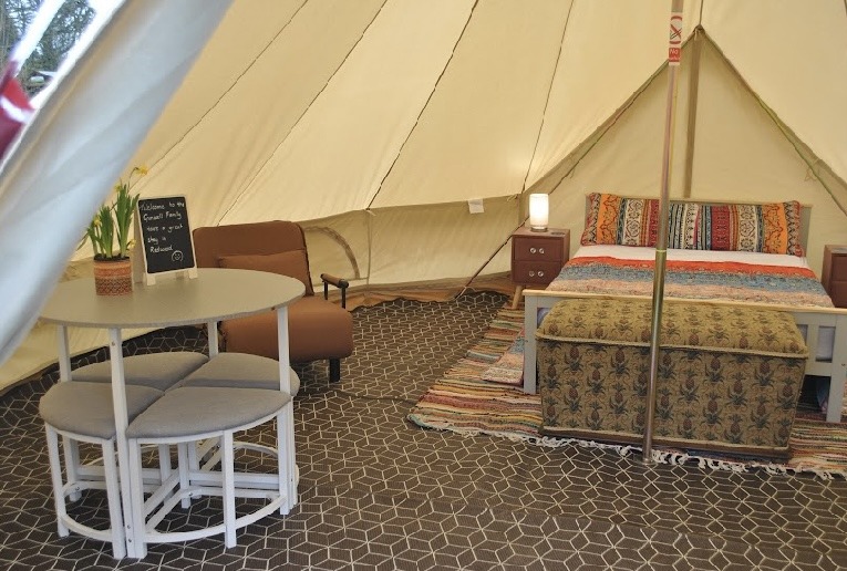 photo showing double the home from home interior of a bell tent