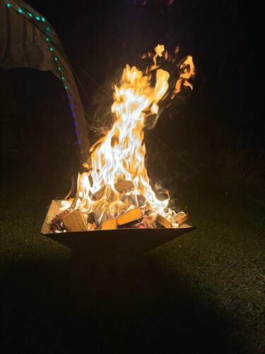 A bright cosy fire a dark chilly evening
