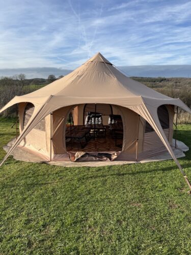 Star tent setting with Staffordshire Moorlands in the background