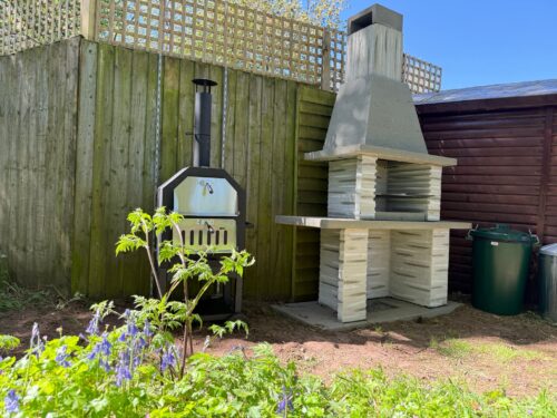 Communal BBQ and pizza oven area
